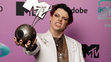 Yungblud poses with Best Alternative Award in the winners room during the 2021 MTV Europe Music Awards 